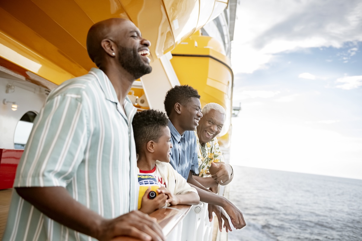 Guests enjoying a laugh onboard Disney Cruise Line